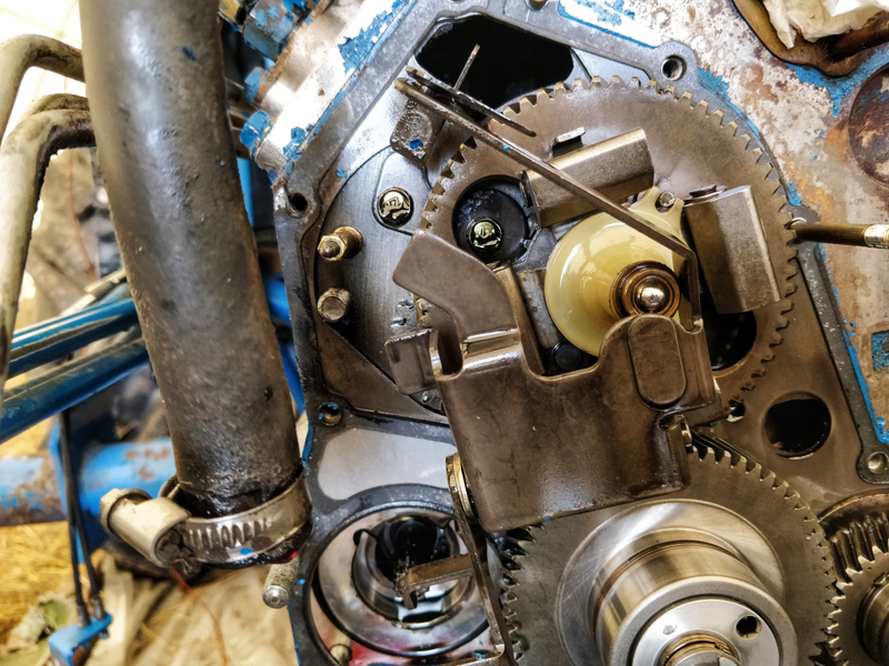 I failed to take a picture after the governor mechanism and oil-pump/idler gear were removed, but just that irritating cam gear to go.